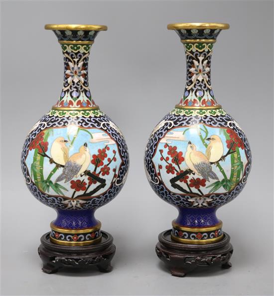 Two cloisonne vases on associated stands